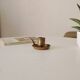 Antique hand-held candlestick in gilded bronze