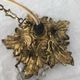 Vintage tassel chandelier has 2 glass and brass crowns
