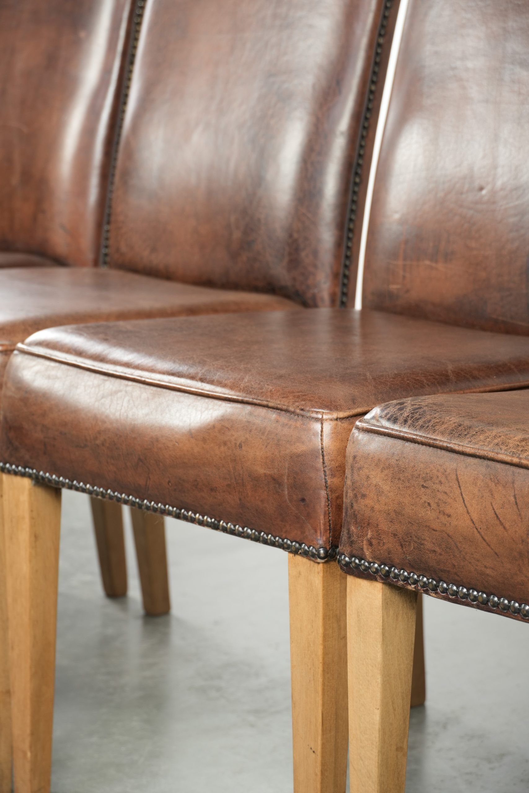 Vintage set of 4 dining chairs made of sheepskin leather with a high back