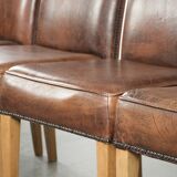 Vintage set of 4 dining chairs made of sheepskin leather with a high back