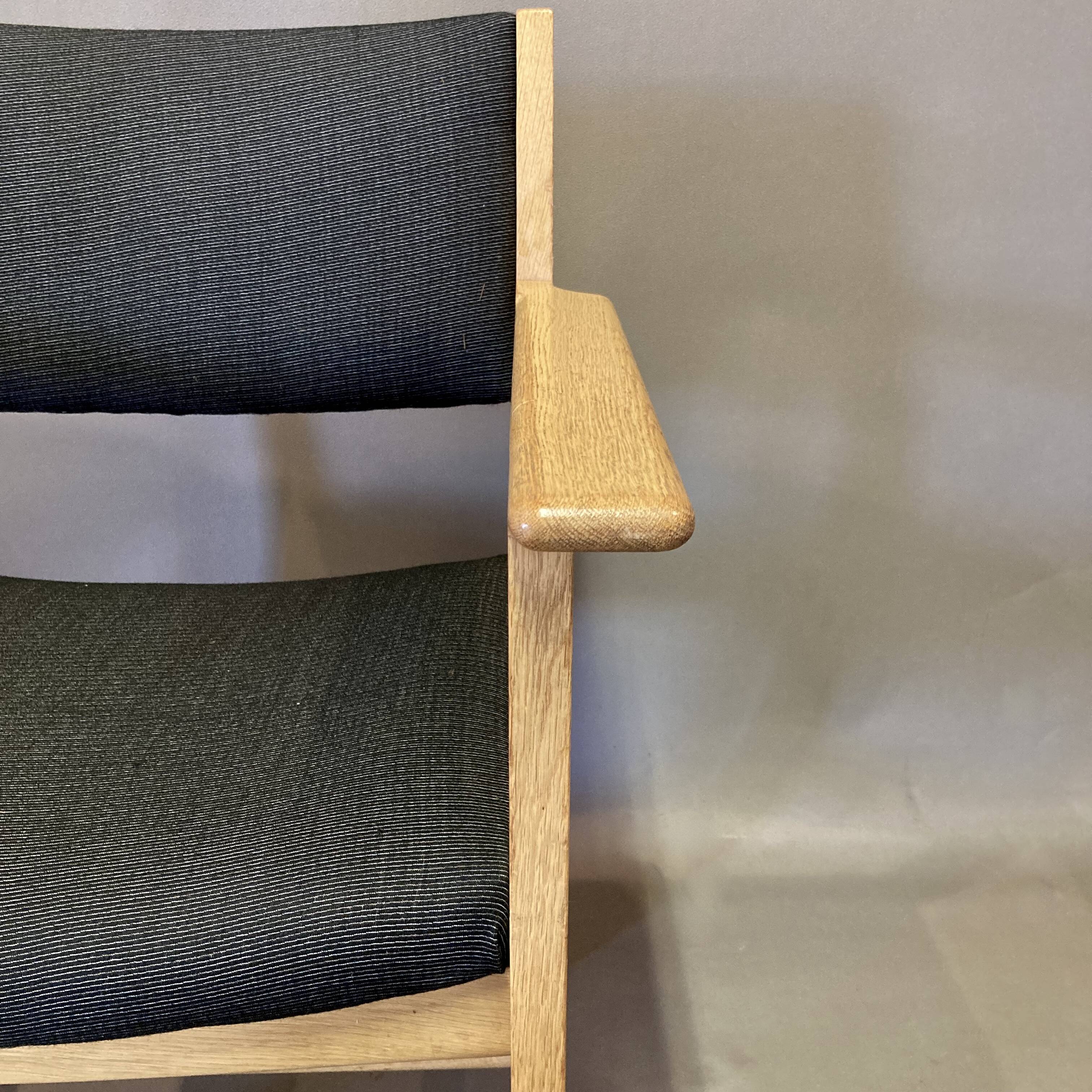 Designer armchair “hans wegner” 1960.