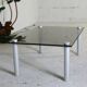 Coffee table cylindrical footings, tray smoked glass, circa 1970
