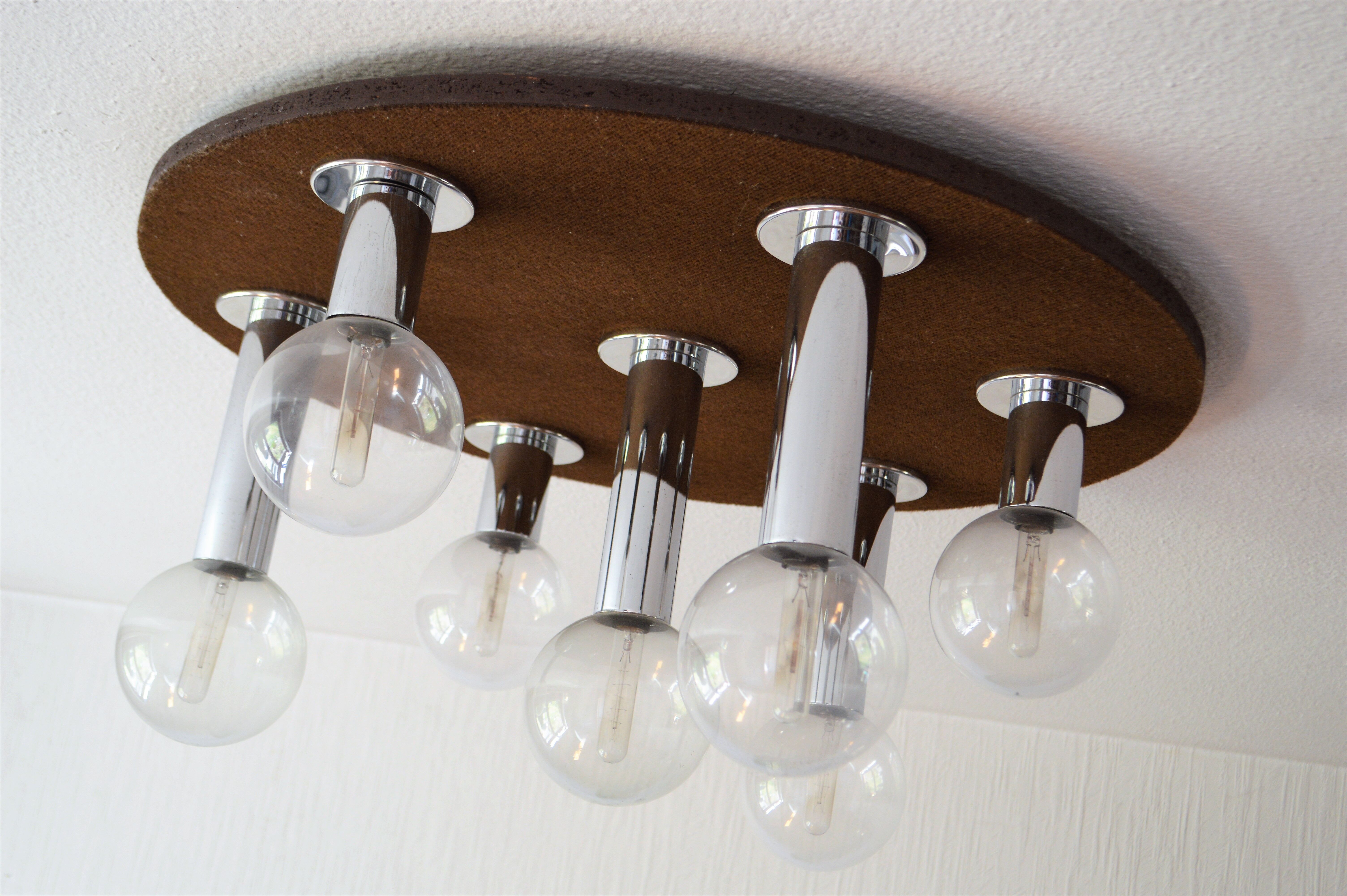 Vintage lamp of the 70s design in chrome glass space age