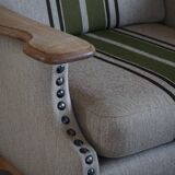 Pair of high-back lounge chairs in modern Danish style in the manner of Henning Kjærnulf, 1960s.