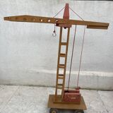 Vintage wooden crane toy from the 60s