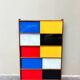 Closed bookcase in Bauhaus colors by D.Rozaffy Edition Meuble Oscar, design 1960