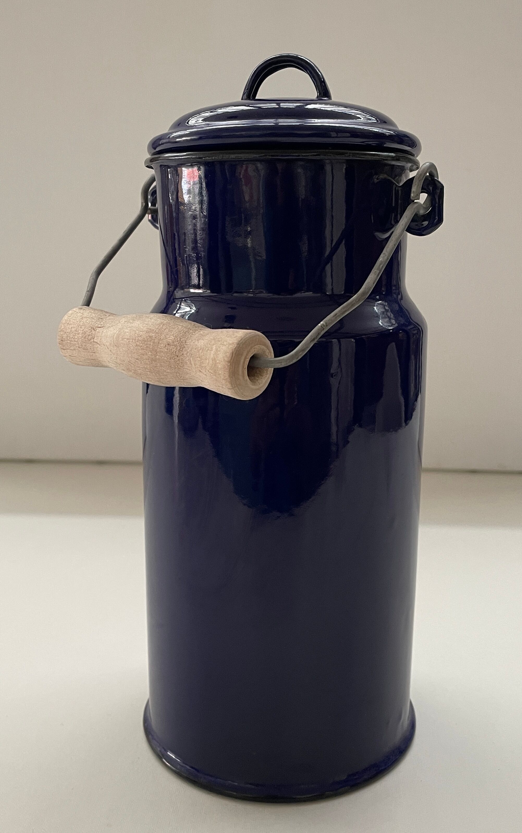 Blue enamelled milk jug