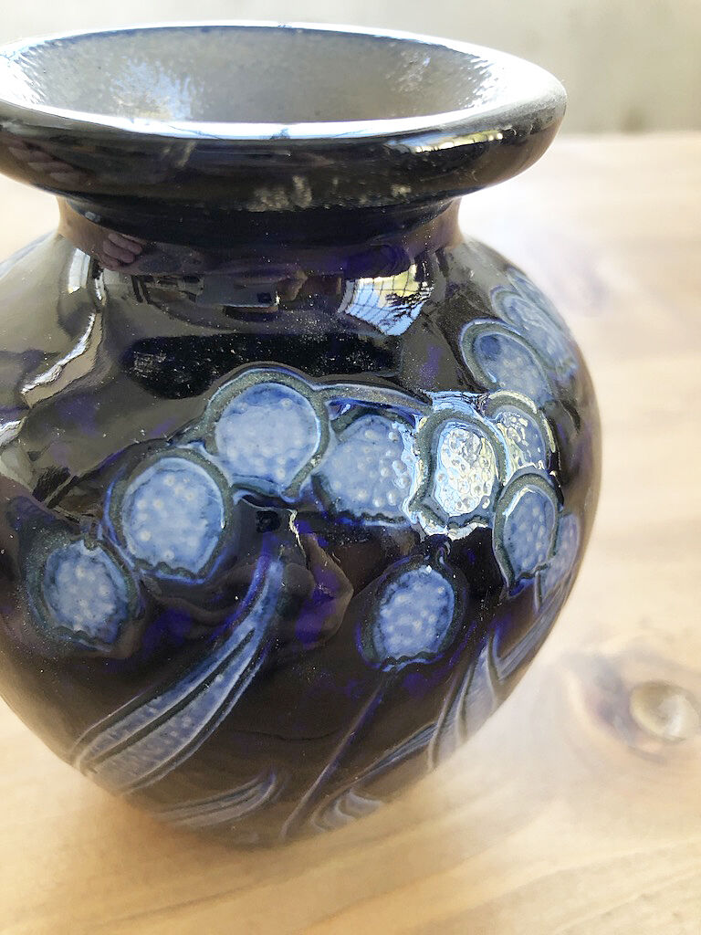Artisan vase with floral motifs