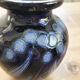 Artisan vase with floral motifs