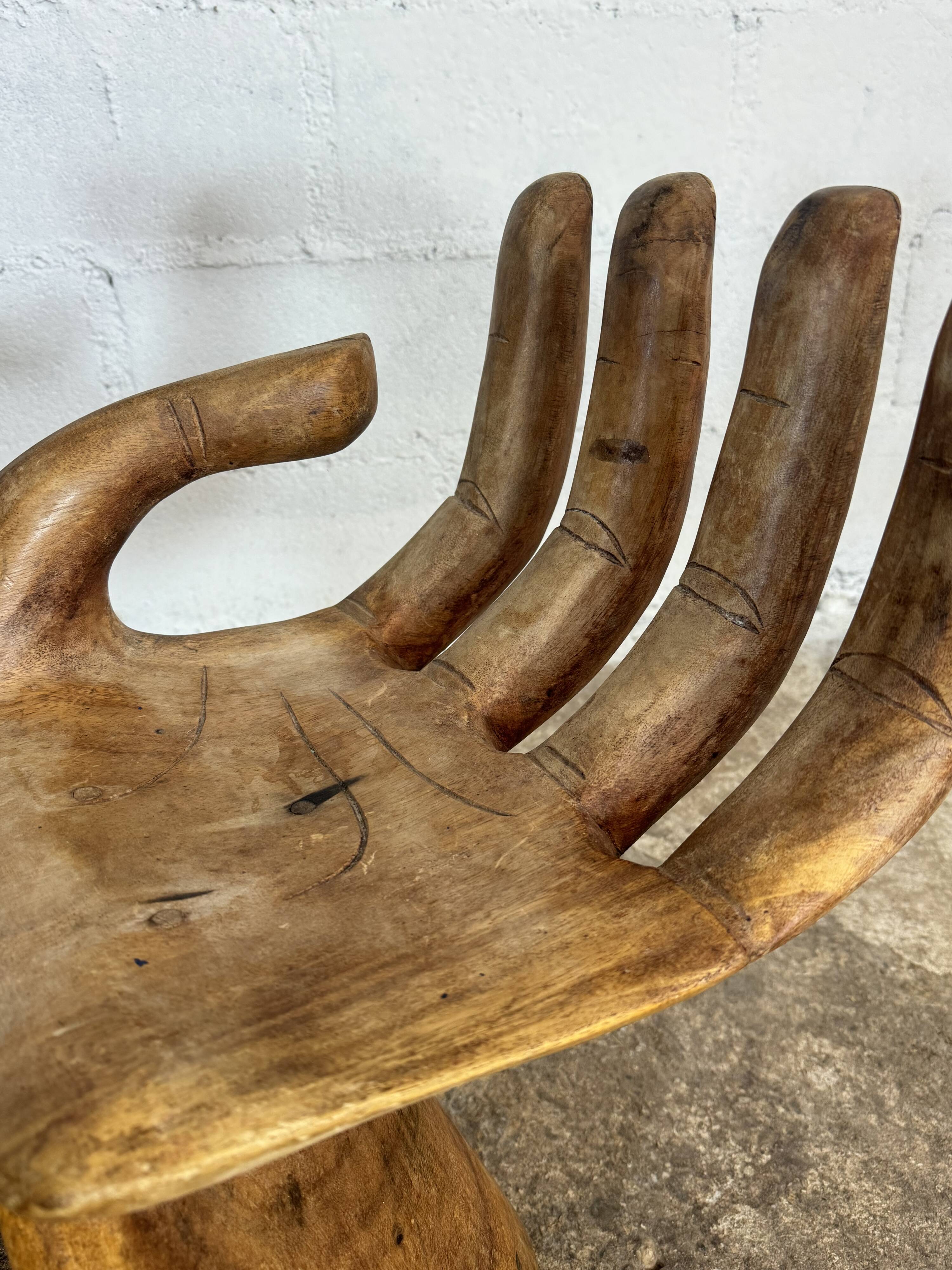 Hand carved chairs in the Pedro Fiedeberg style