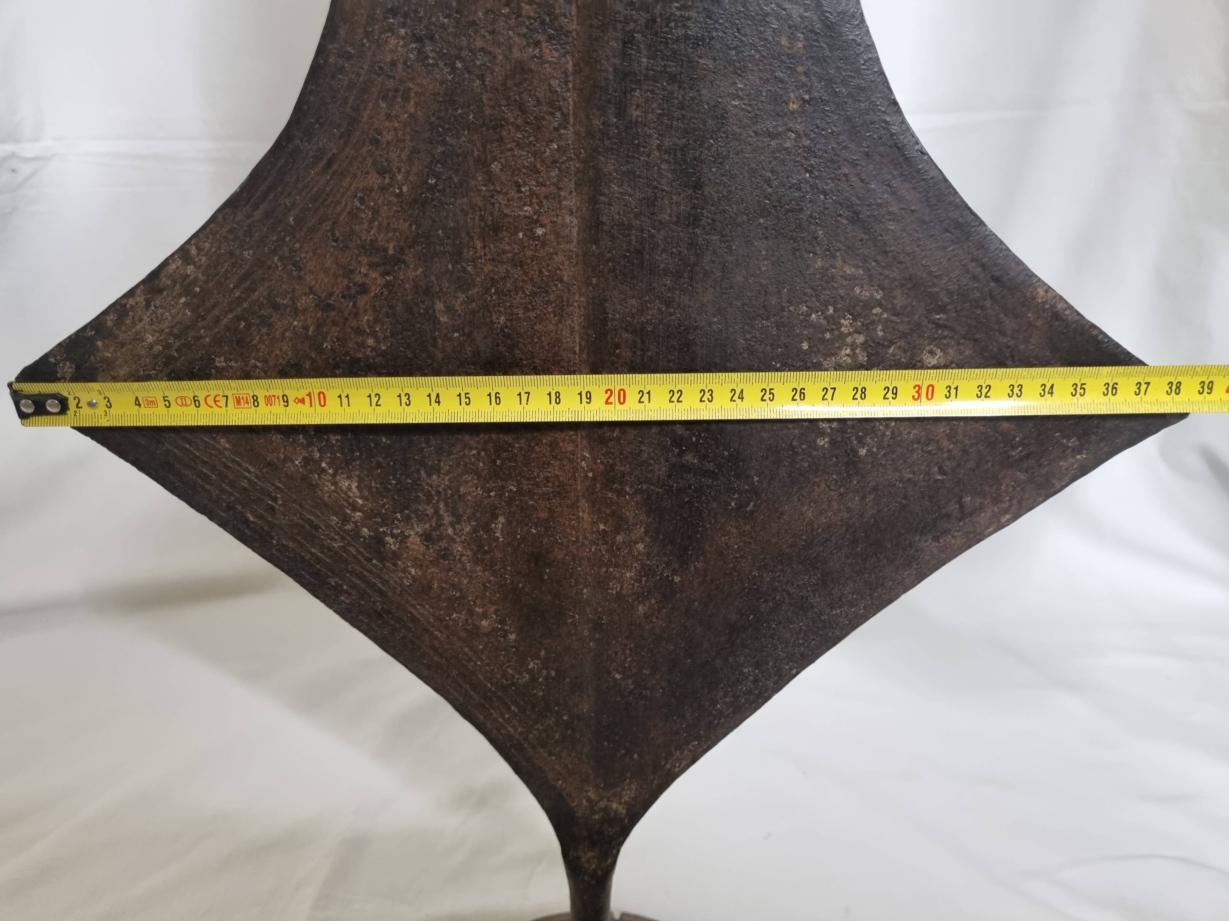 Large Topoké coin, also known as Liganda, wrought iron, sculptural, late 19th century, 160 cm