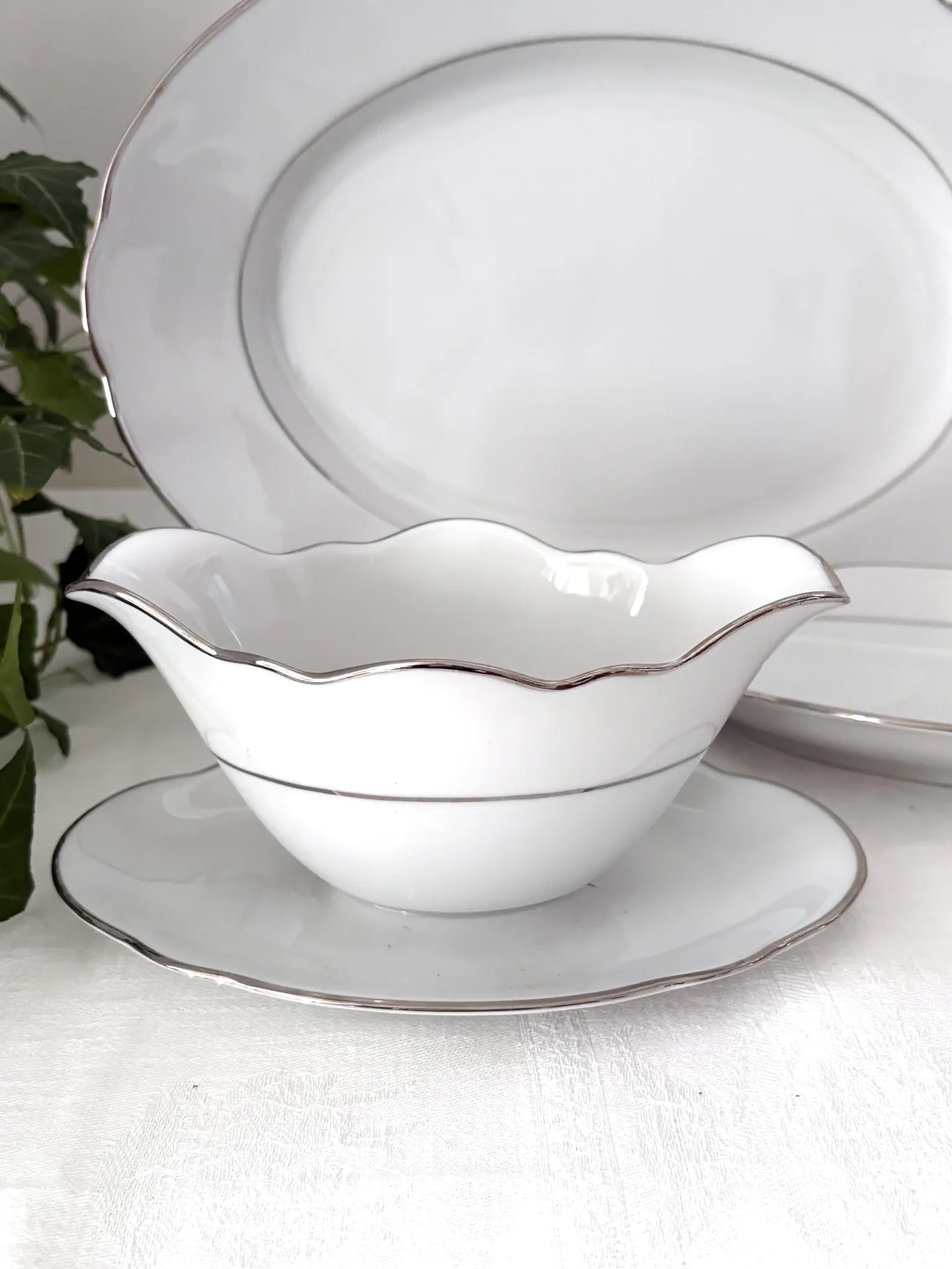 3 white porcelain plates