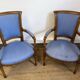 Paire de fauteuils de style Louis XVI en bois sculpté