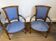 Paire de fauteuils de style Louis XVI en bois sculpté