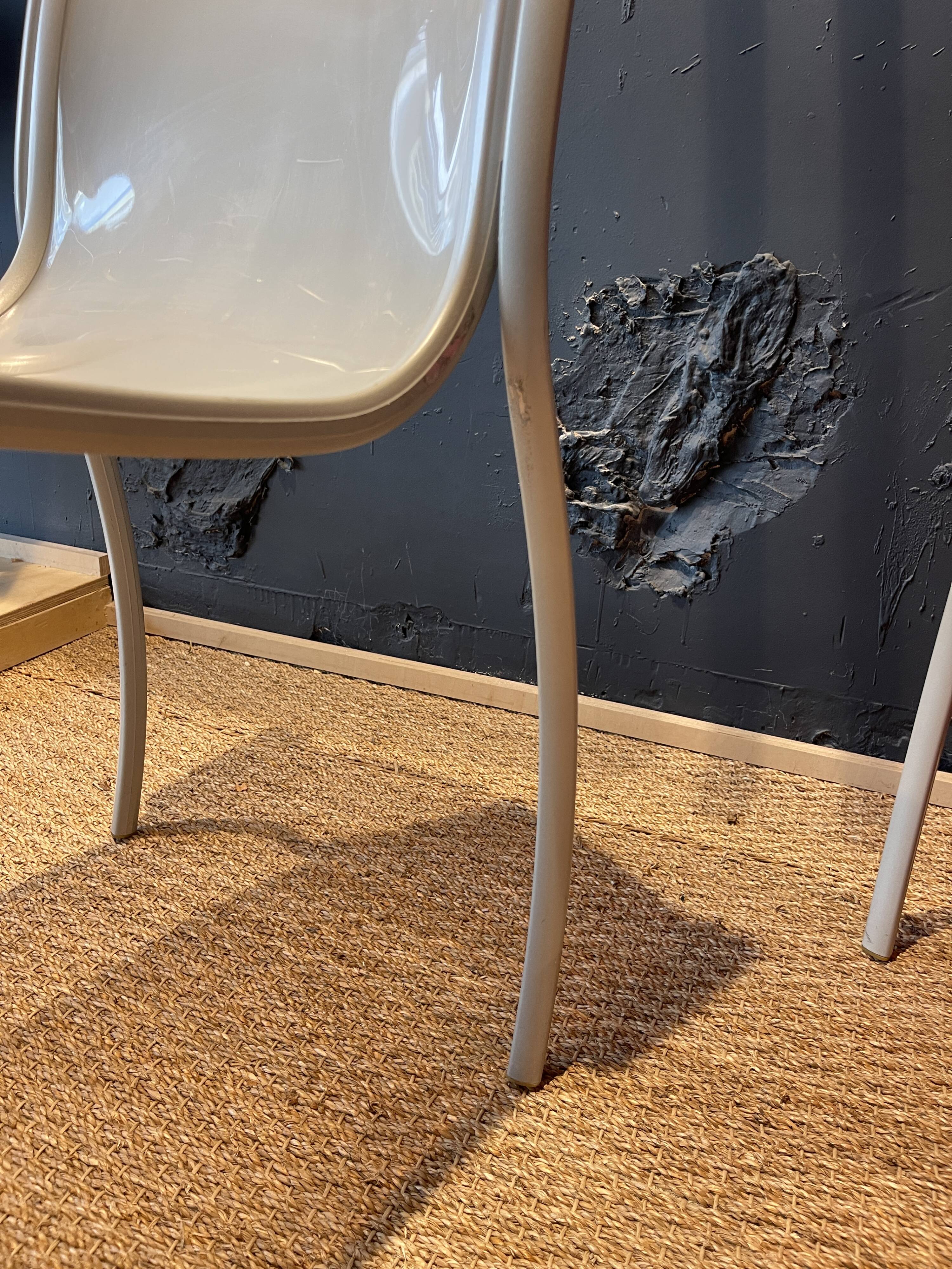 Pair of FPE chairs by Ron Arad for Kartell translucent and red Italy