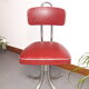 Chaise pivotante skaï bordeau 1960