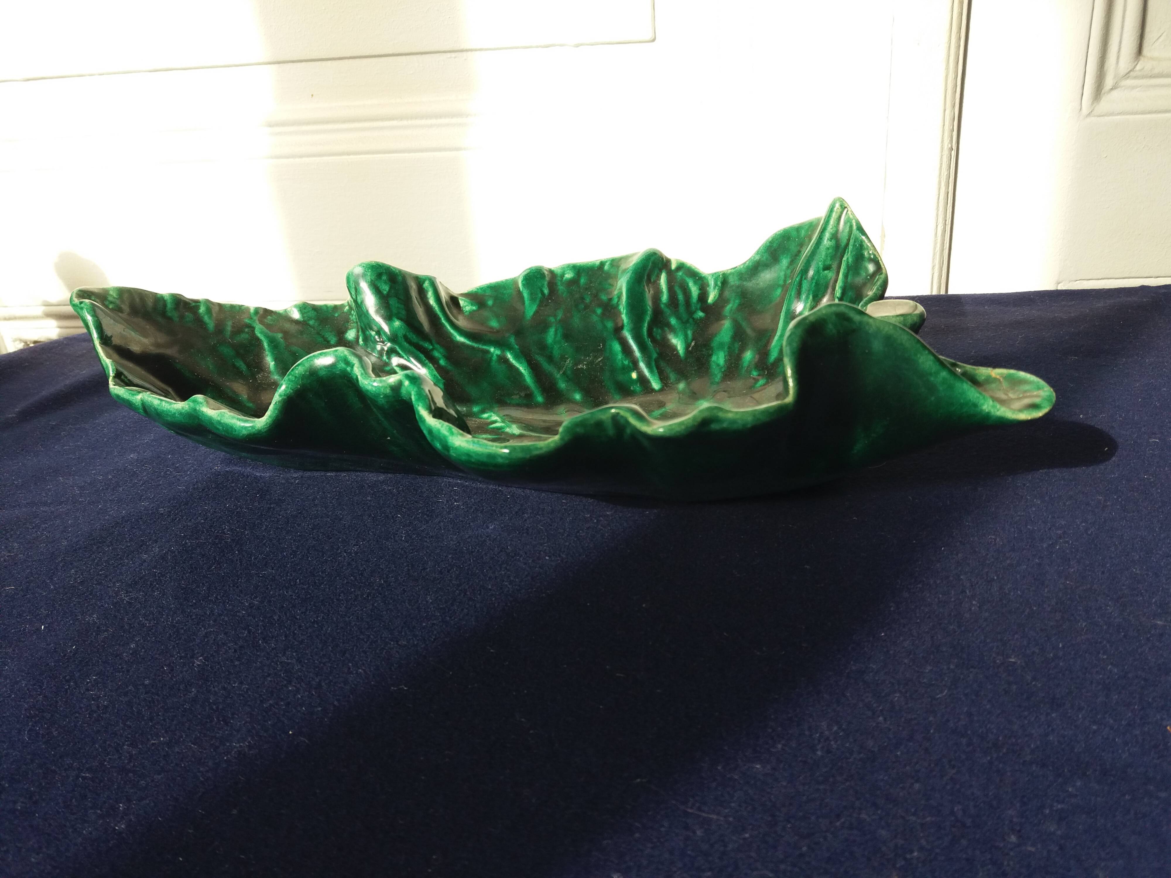 Artist's cup in the shape of a leaf in slip signed