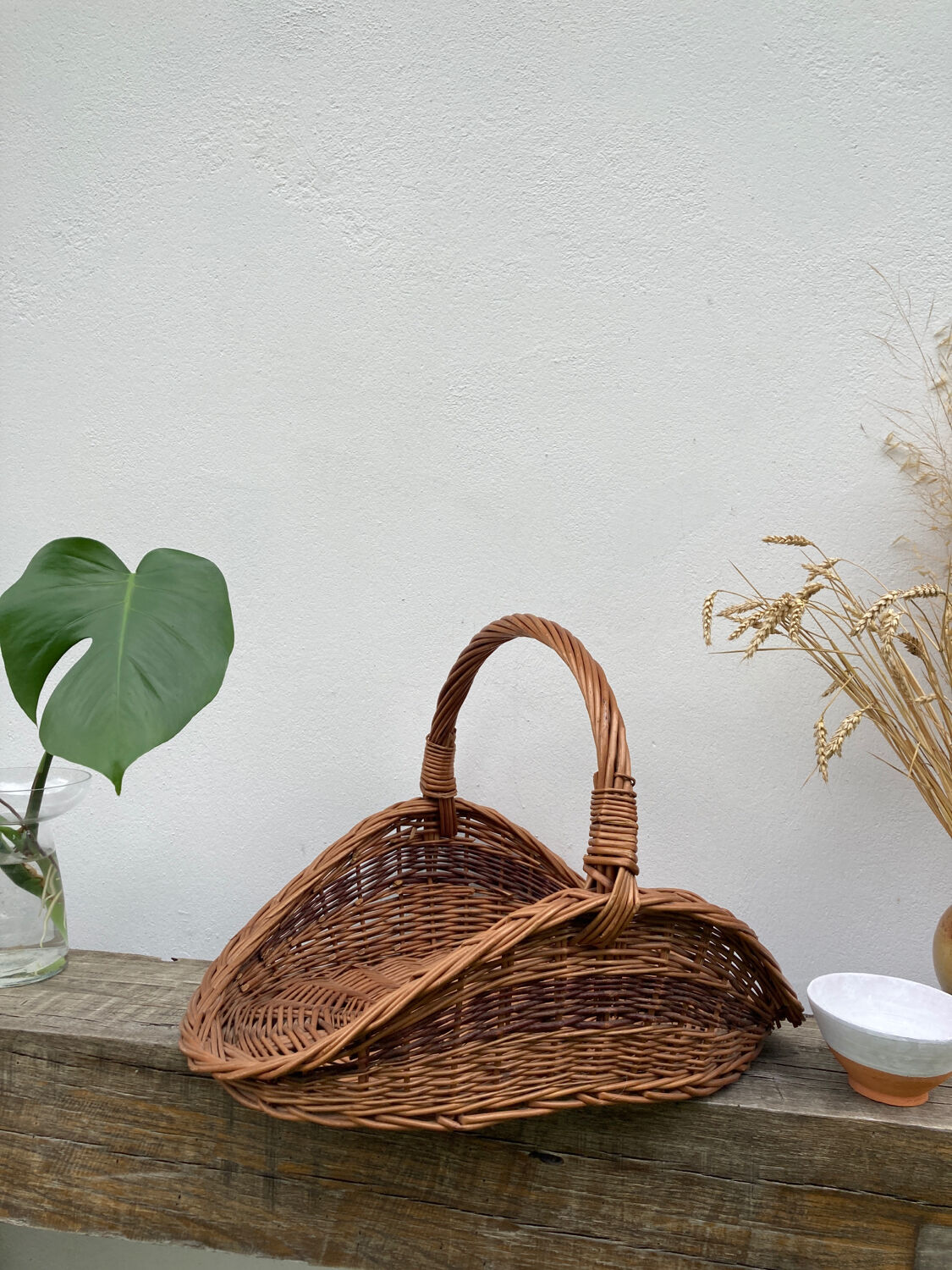 Large old woven wicker log basket