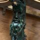 Carved wooden console and gray marble