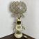 Brass lamp, metal and mother-of-pearl