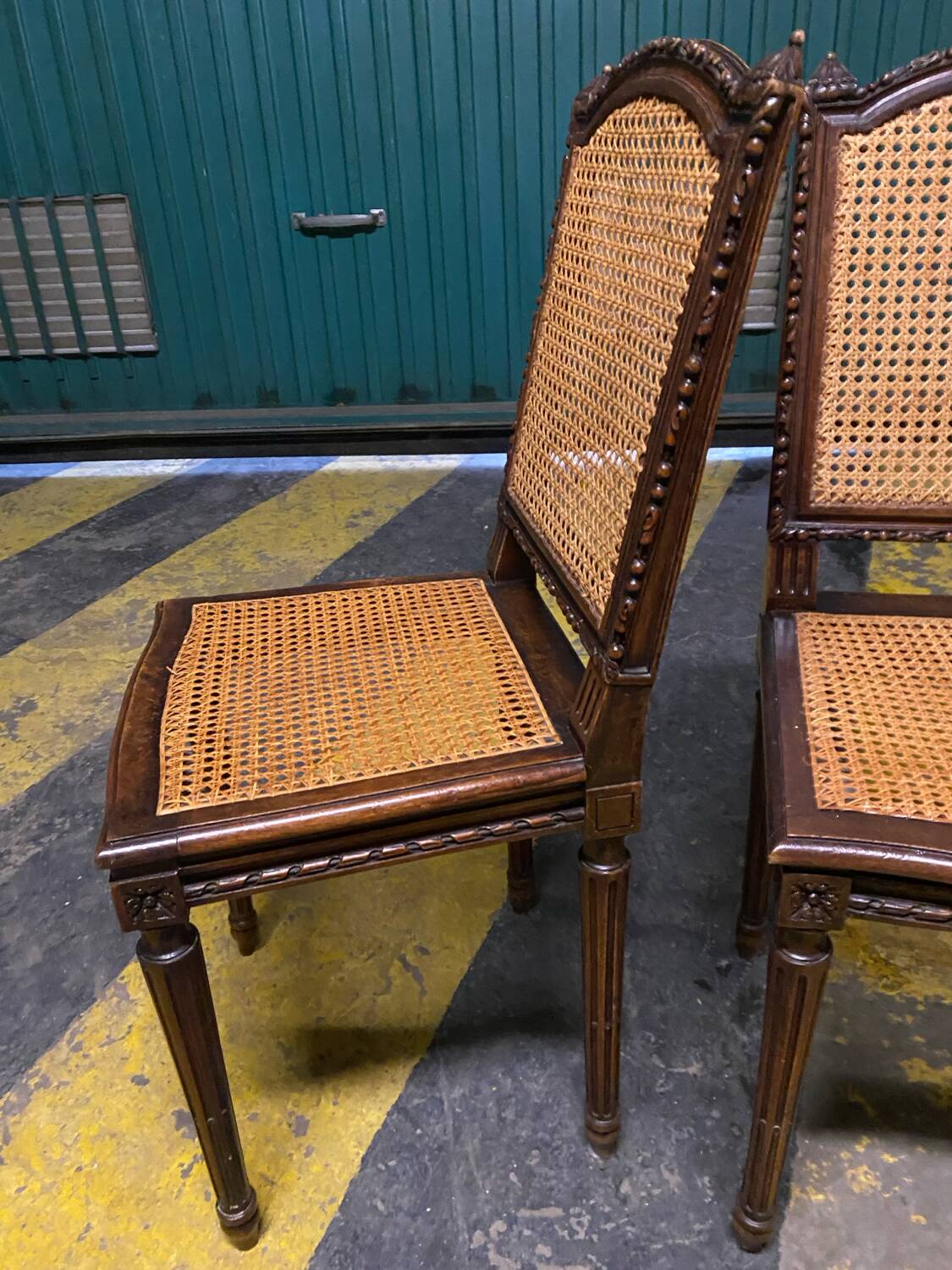Louis XVI style caned chairs