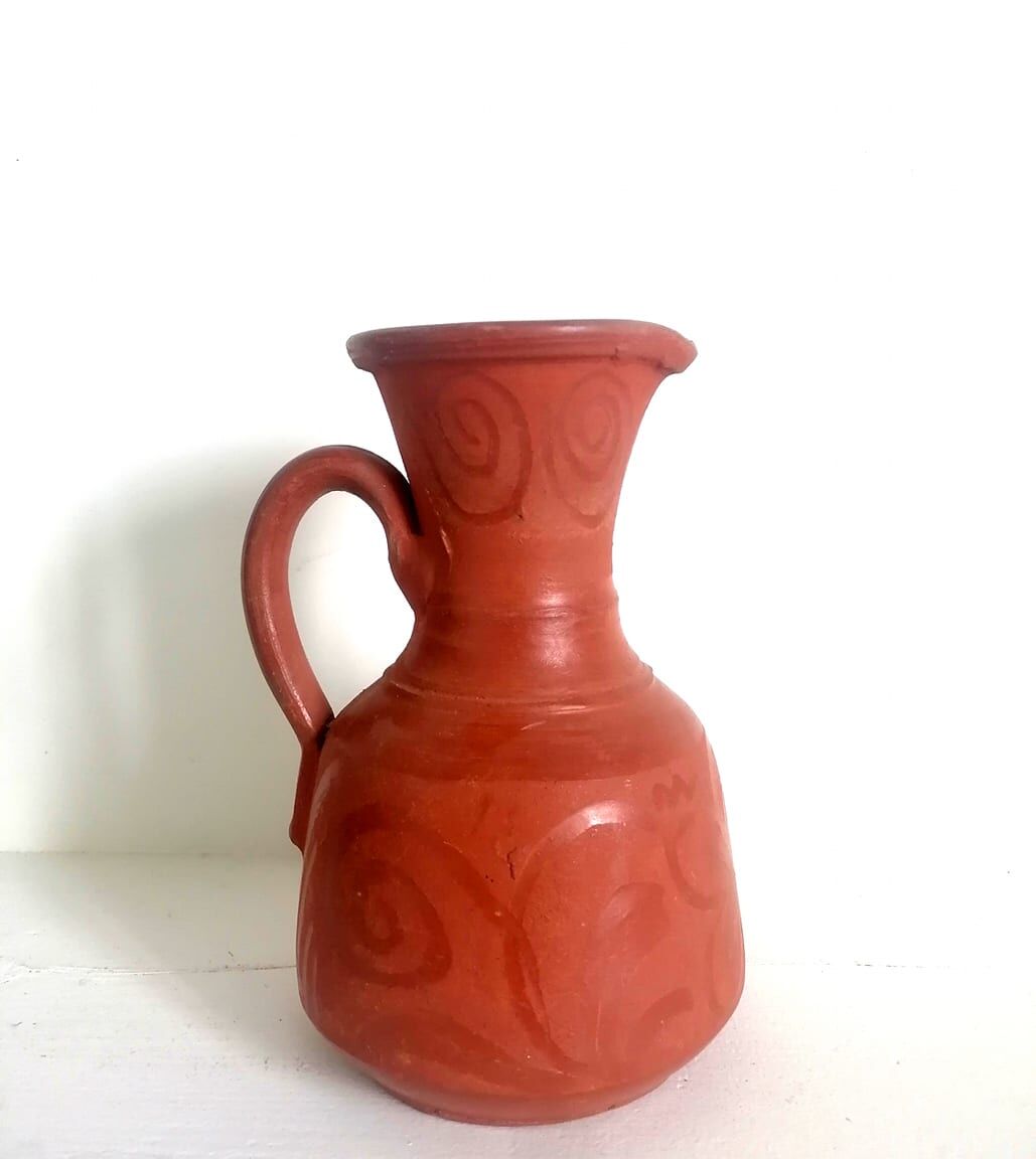 Pitcher in oriental terracotta