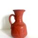 Pitcher in oriental terracotta