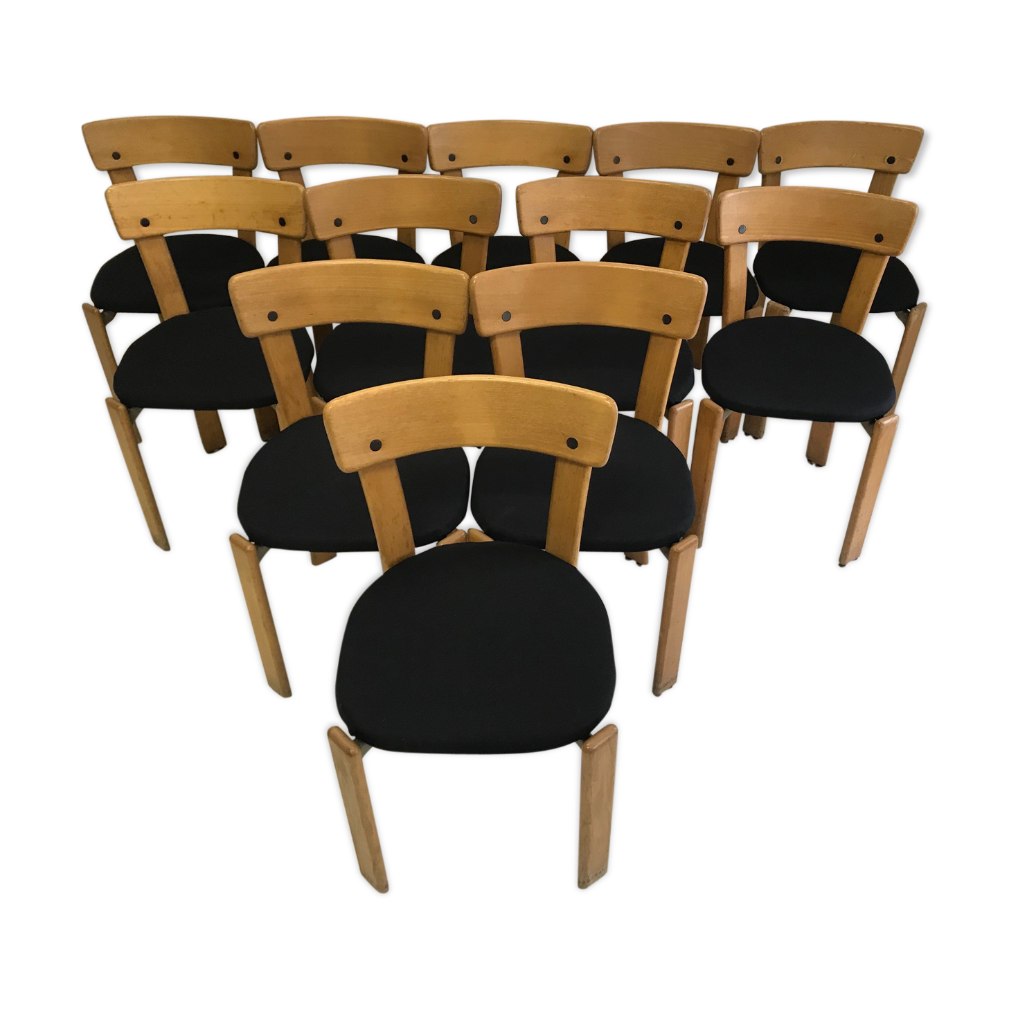 Designer Bruno Rey's suite of 12 chairs