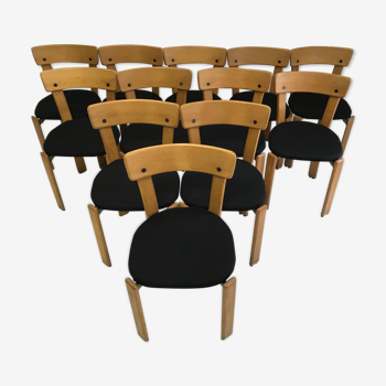 Suite de 12 chaises du designer Bruno Rey