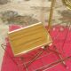 Gilded metal magazine rack and ashtray