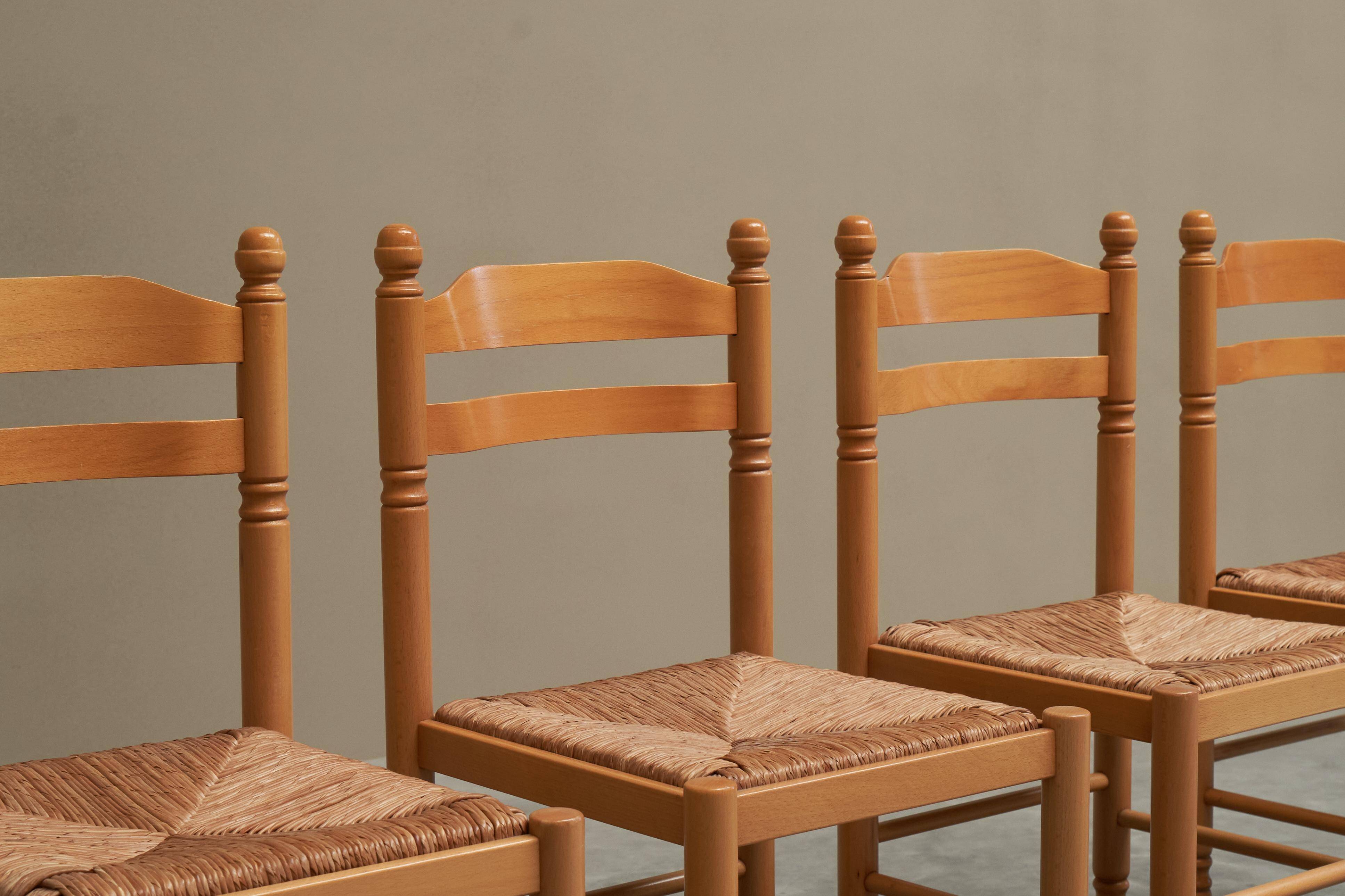 Set of 4 Mid Century beech dining chairs from the 1970s.