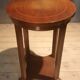 Varnished round gueridon