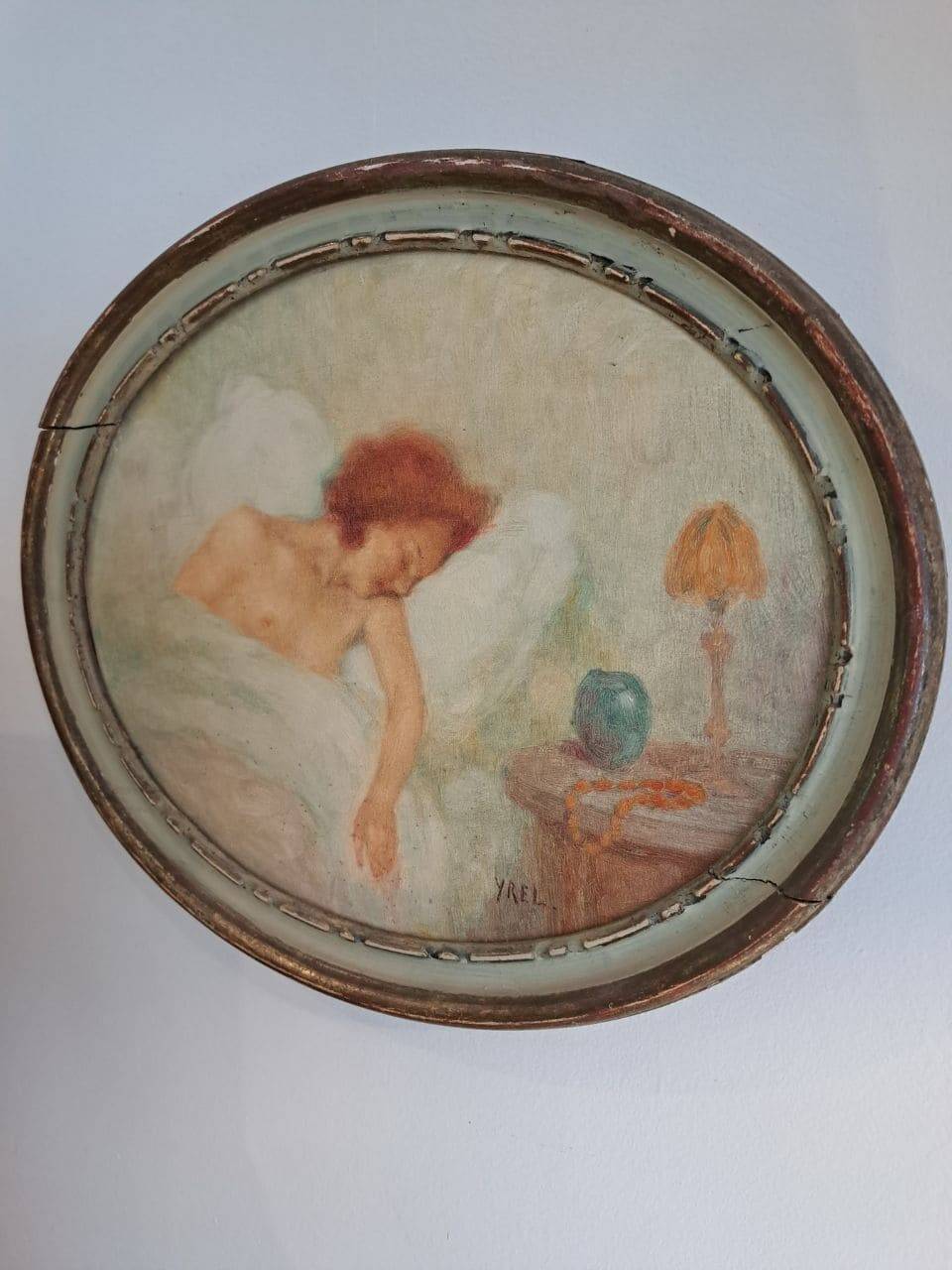 Ancient oval painting of a sleeping woman in oil on wood panel.