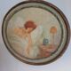 Ancient oval painting of a sleeping woman in oil on wood panel.