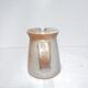 Vintage creamer in marsh sandstone