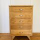 Vintage chiffonier with compass feet