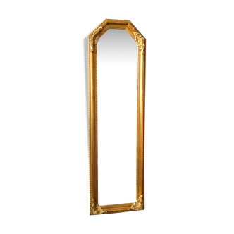 Old slim golden mirror