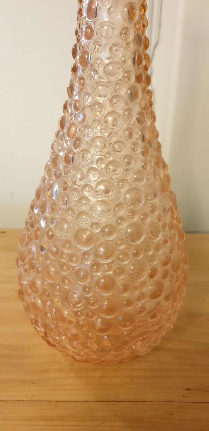 Rare pink polished glass bottle