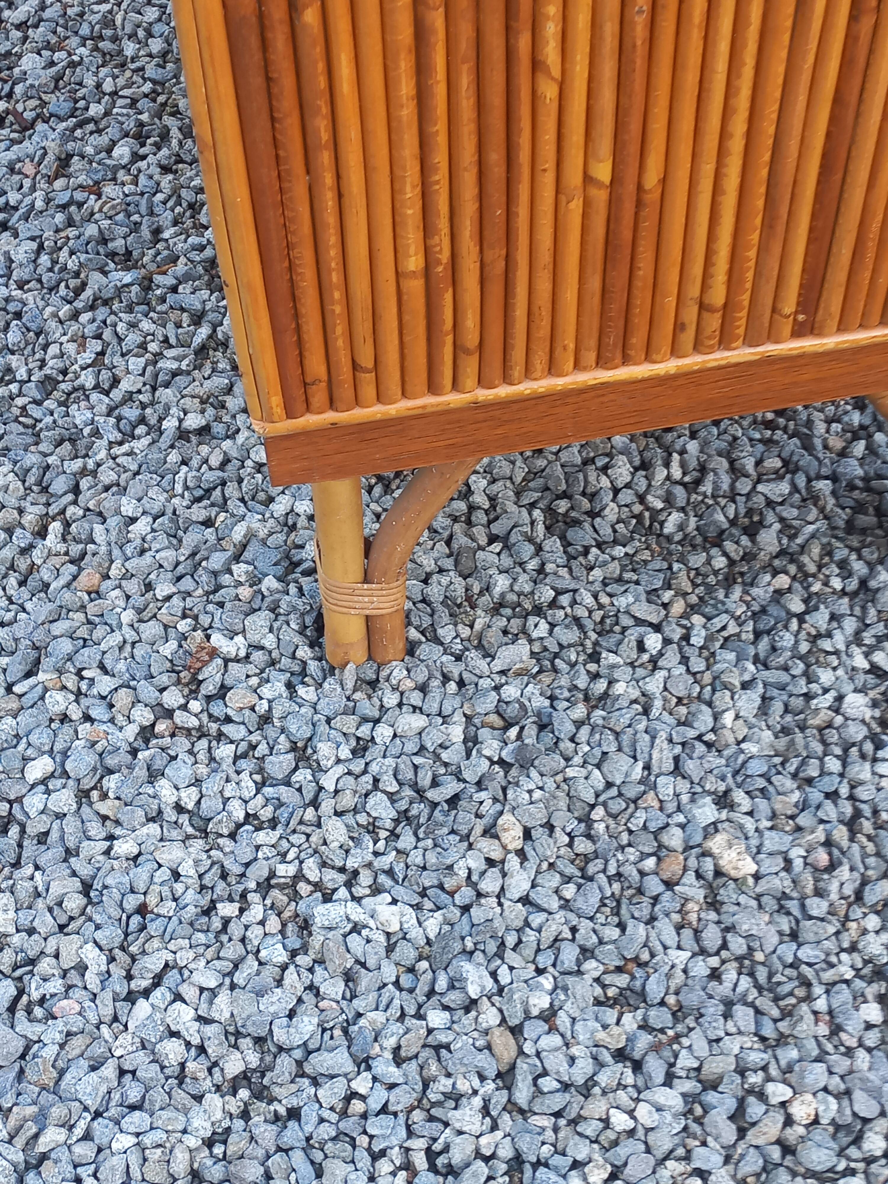 Bamboo and rattan enfilade attributed to Audoux and Minet.