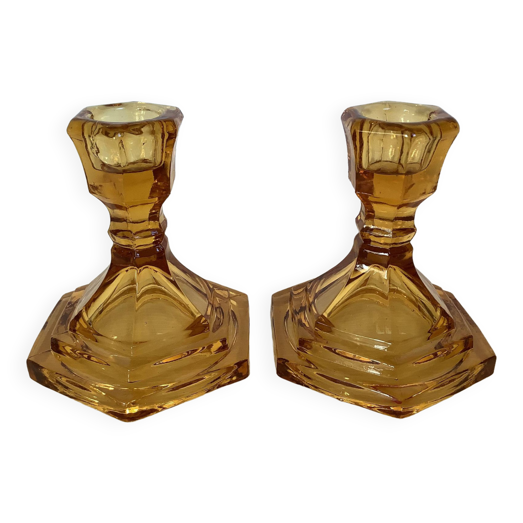 Paire de bougeoirs verre moulé jaune