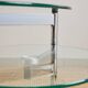 Table basse en verre et métal tubulaire avec plateaux pivotants