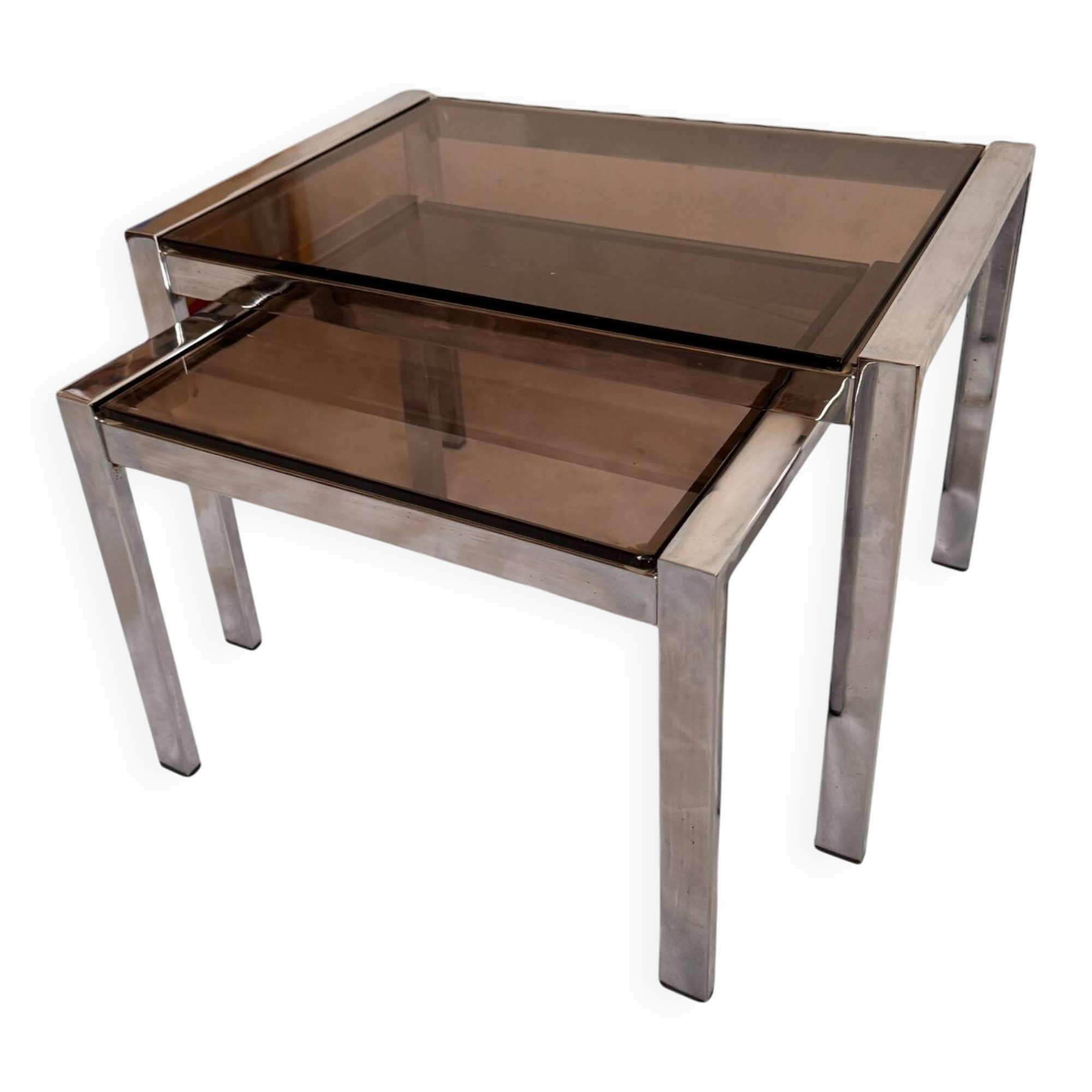 Vintage nesting tables from the 1970s, chrome and smoked glass, mid-century modern.