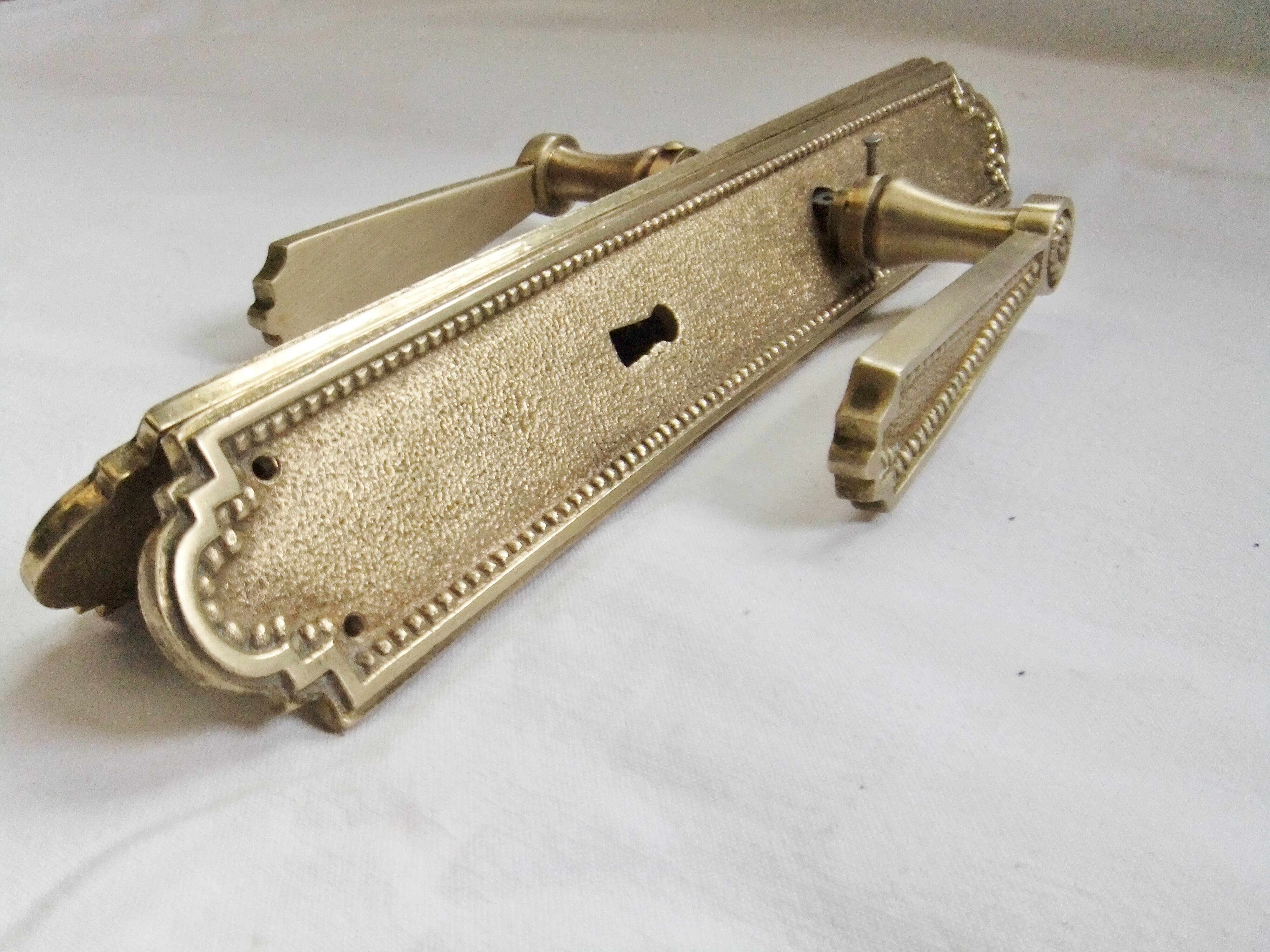 Pair of Louis XVI style beaded bronze door handles