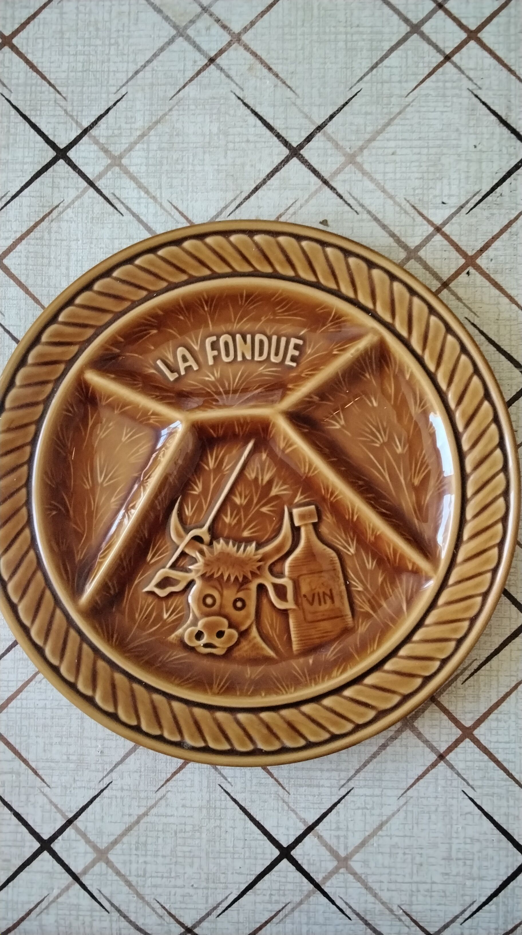 Antique barbotine plates from Sarreguemines, 1970.