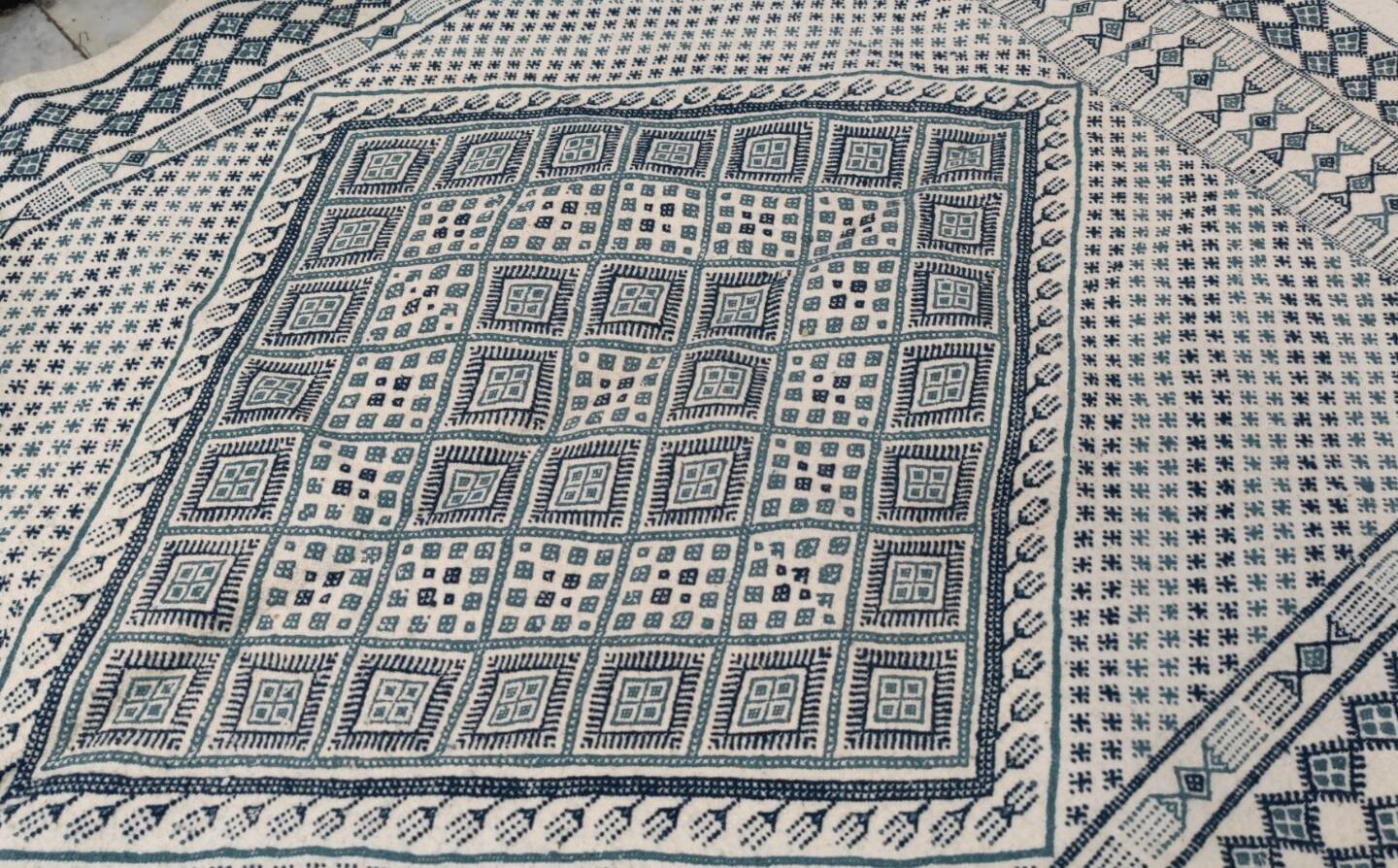 Blue and white hand-woven margoum rug