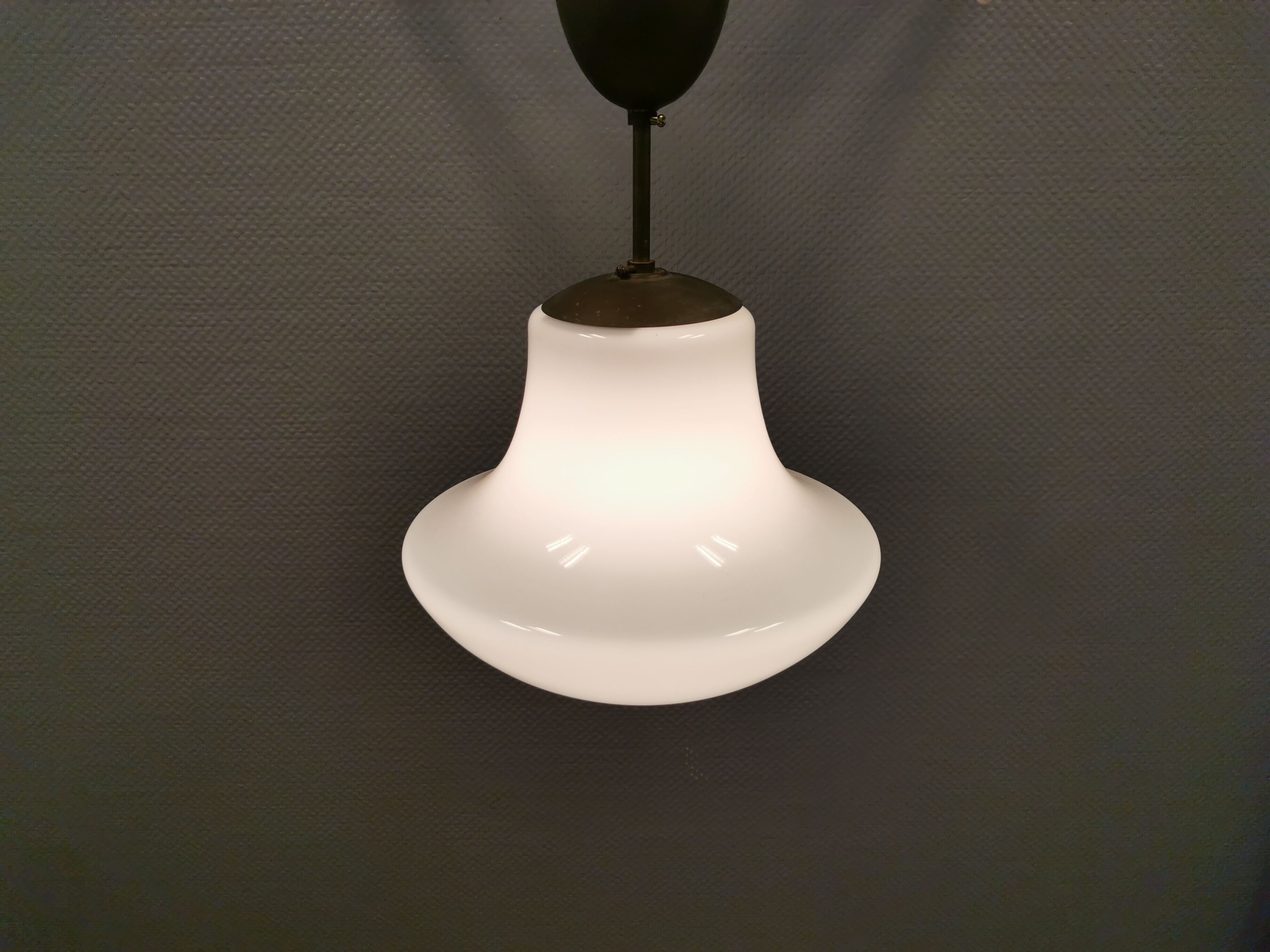 Older ceiling/hanging lamp in milky white opaline glass.