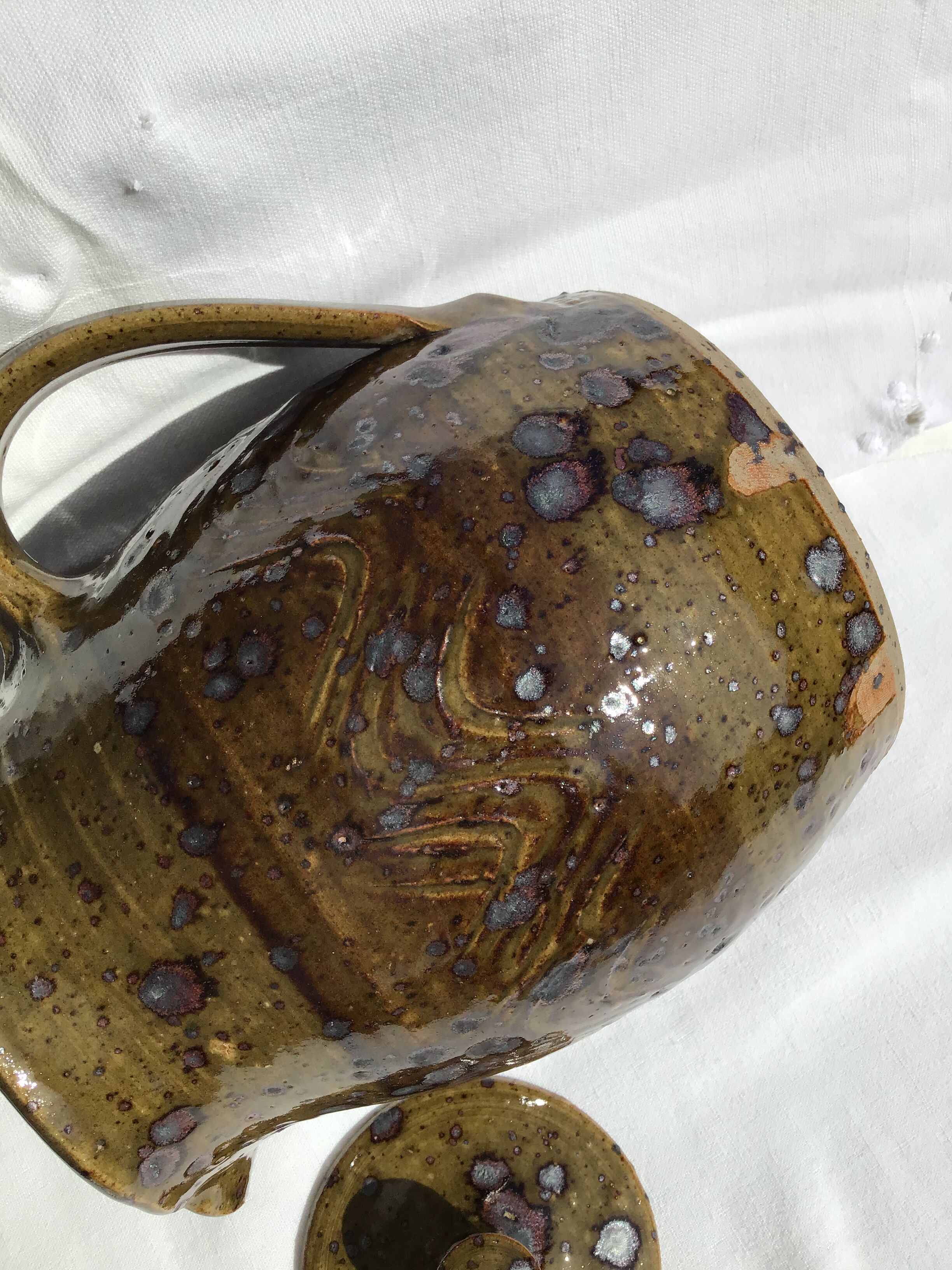 Signed olive green pyrity sandstone tea