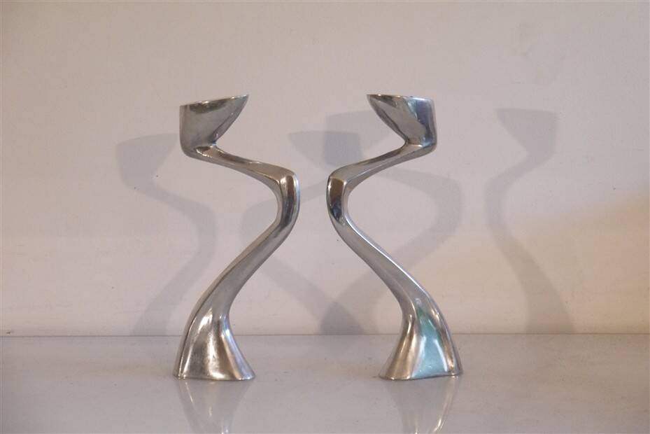 Pair of aluminium cast candle holders