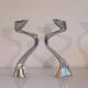 Pair of aluminium cast candle holders