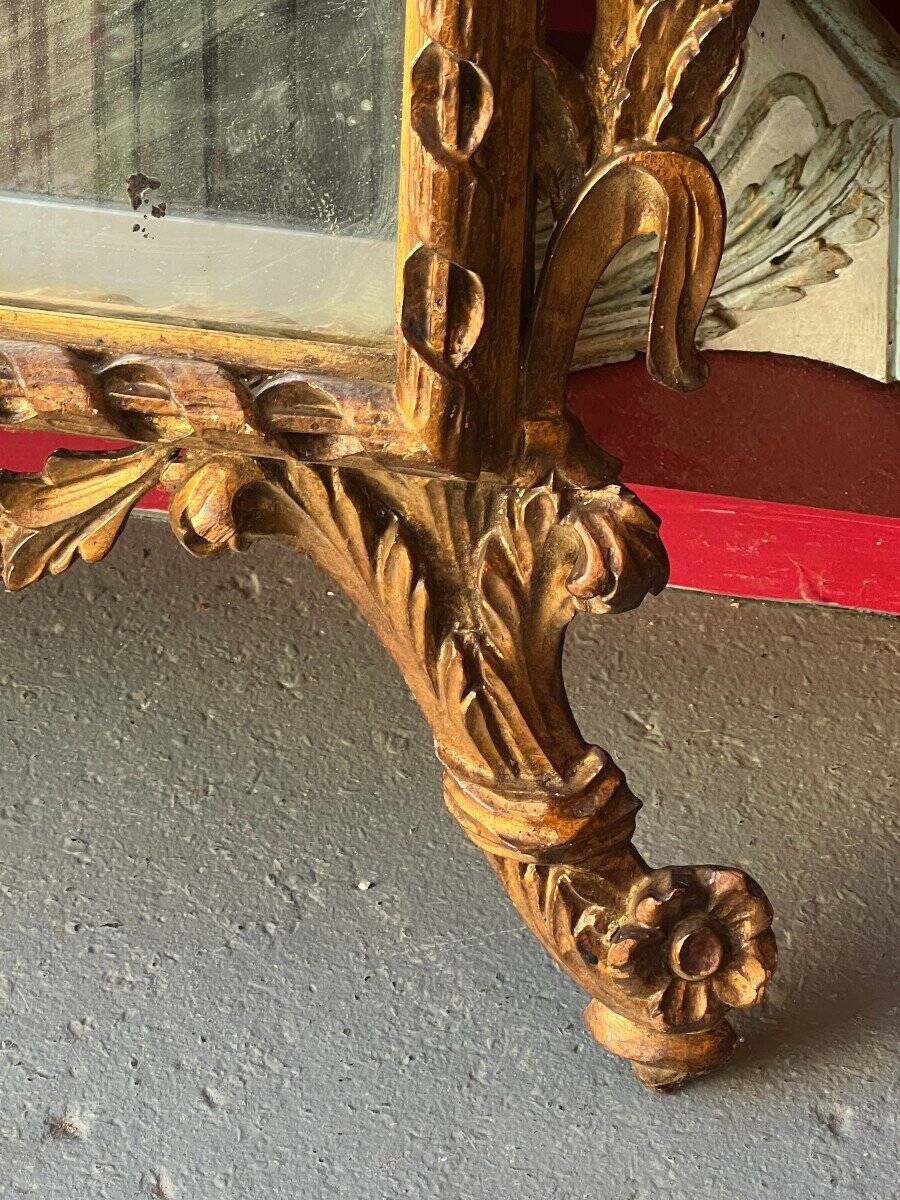 Antique mirror above a chest of drawers or between two windows, carved wood, 18th century